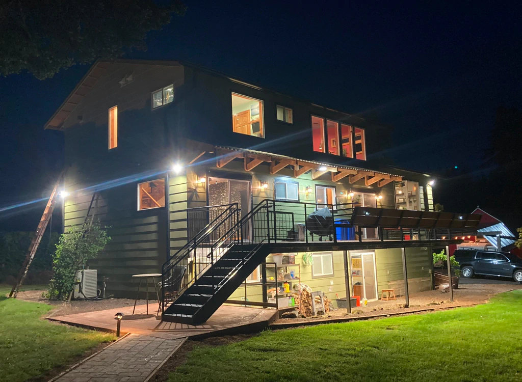 exterior view of a house with newly installed lighting